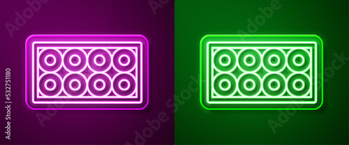 Glowing neon line Skateboard wheel icon isolated on purple and green background. Skate wheel. Vector