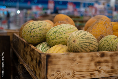 Ripe melons on the store counter, close-up.