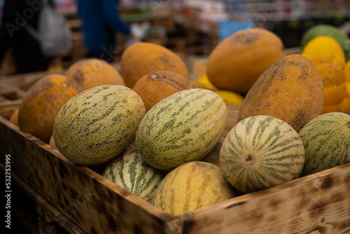 Ripe melons on the store counter, close-up.