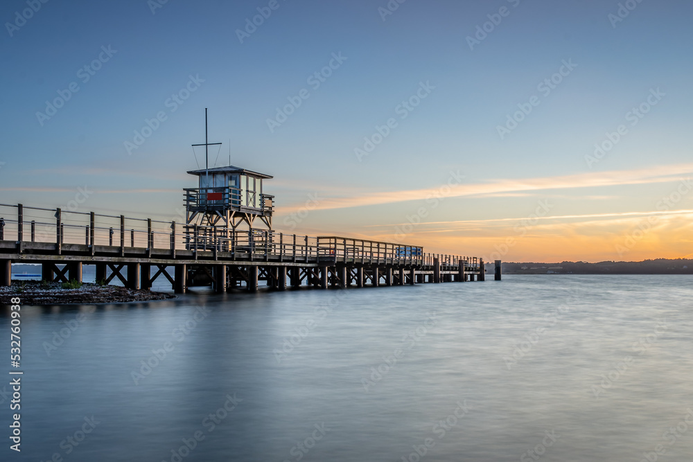 Glucksburg pier on the Baltic Sea. Fjord, Flensburg, Germany, Schleswig-Holstein Glucksburg pier on the Baltic Sea. Fjord, Flensburg, Germany, Schleswig-Holstein