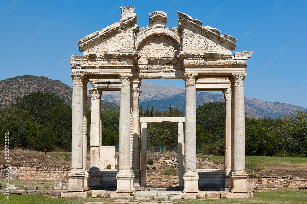 Tetrapylon ancient monument ruins in Aphrodisias. Archaeology landmark in Turkey