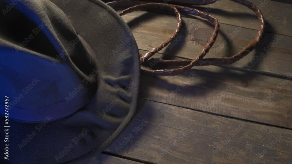 Travel concept background Indiana Jones style hat and the whip Travel concept background Indiana Jones style hat and the whip