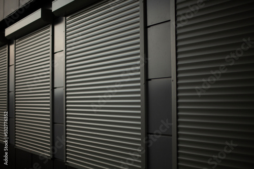 Closed shop. Steel blinds. Blinds on office windows.