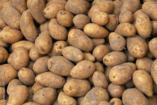 Close up heap of new potato at retail display