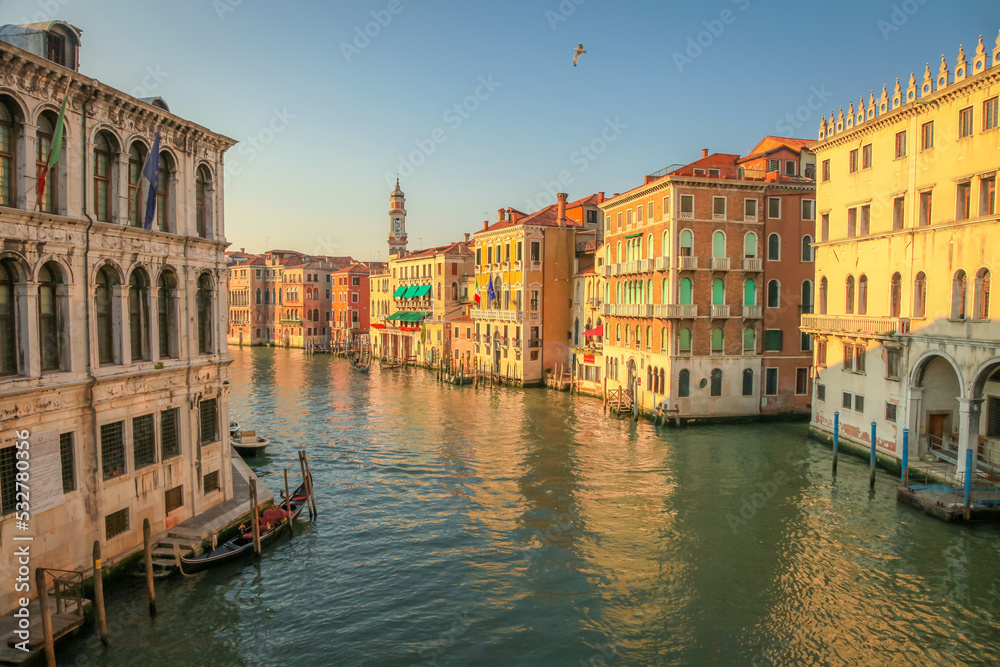 Peaceful Grand Canal scenary near Rialto in romantic Venice at springtime, Italy