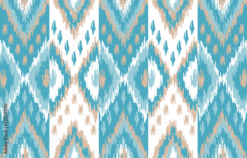 seamless geometric pattern. Tribal Art Ikat Ogee in traditional classic blue colors. based on ikat fabric style. Vector illustration.