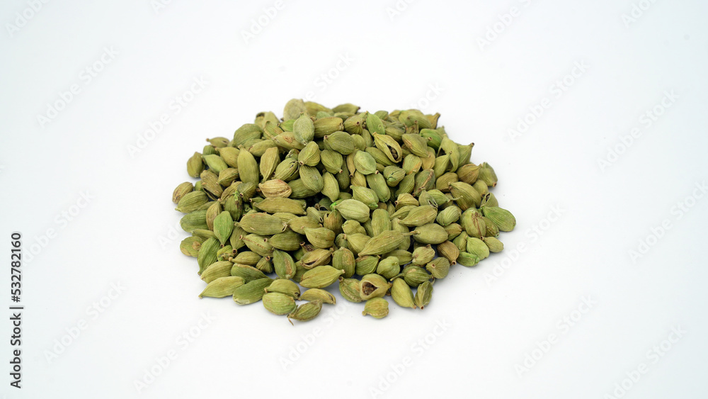 Cardamom pods and seeds isolated on white background. Green cardamom pods isolated on white background with copy space for text or images. Spices, food, cooking concept. Close-up shot. Cardamom pods and seeds isolated on white background. Green cardamom pods isolated on white background with copy space for text or images. Spices, food, cooking concept. Close-up shot.
