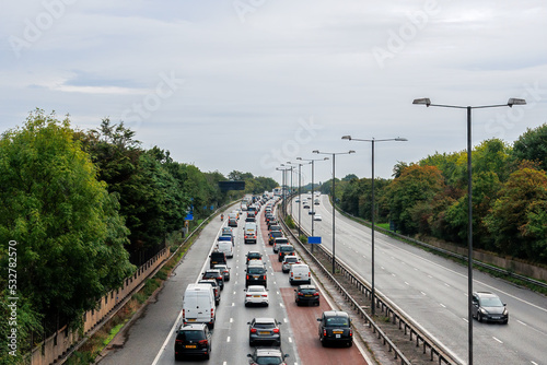 Heavy, slow moving morning rush hour traffic on the M4 motorway, London