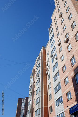 Moscow, Russia - September 20, 2022: Multi-storey high-rise residential buildings against the sky. City building.