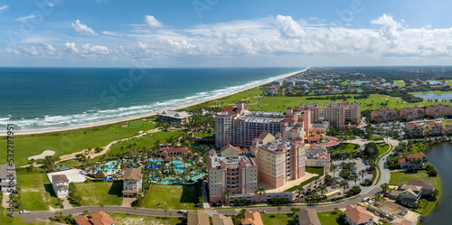 Fototapeta Naklejka Na Ścianę i Meble -  Aerial view of Hammock beach located in Palm Coast, Florida, USA.  September 21, 2022.