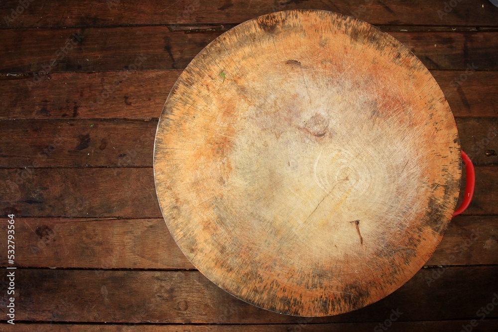 Chopping block on a wooden table Chopping block on a wooden table
