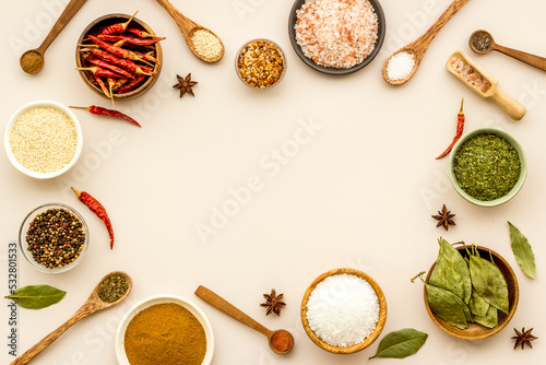 Assortment of cooking flavor - spices and herbs in bowls, top view