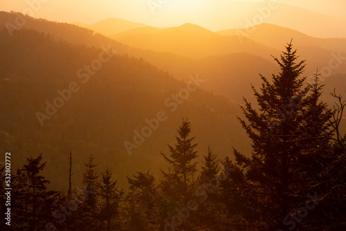 A bright orange sunrise over the Smoky Mountains. 