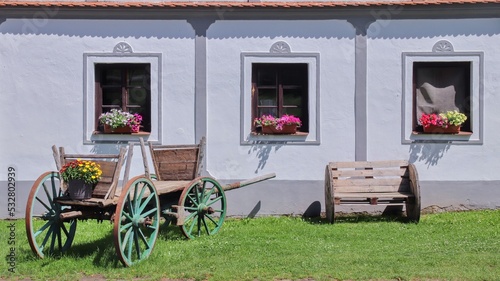 Traditional old folklore homesteads belonging to Unesco cultural heritage at village Holasovice, Czech republic photo
