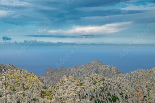 View of the Sierra de Tramuntana in the Spanish island of Mallorca with the sea and the sky in the background