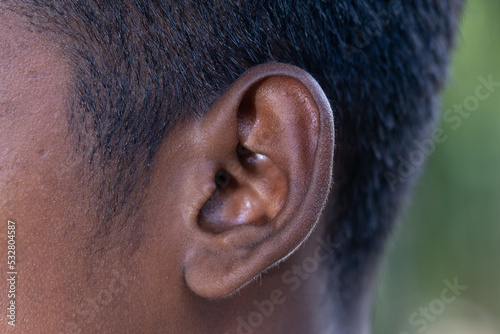Fotografia Human Ear - Close up of a man's ear Its body part helps to hear sound waves