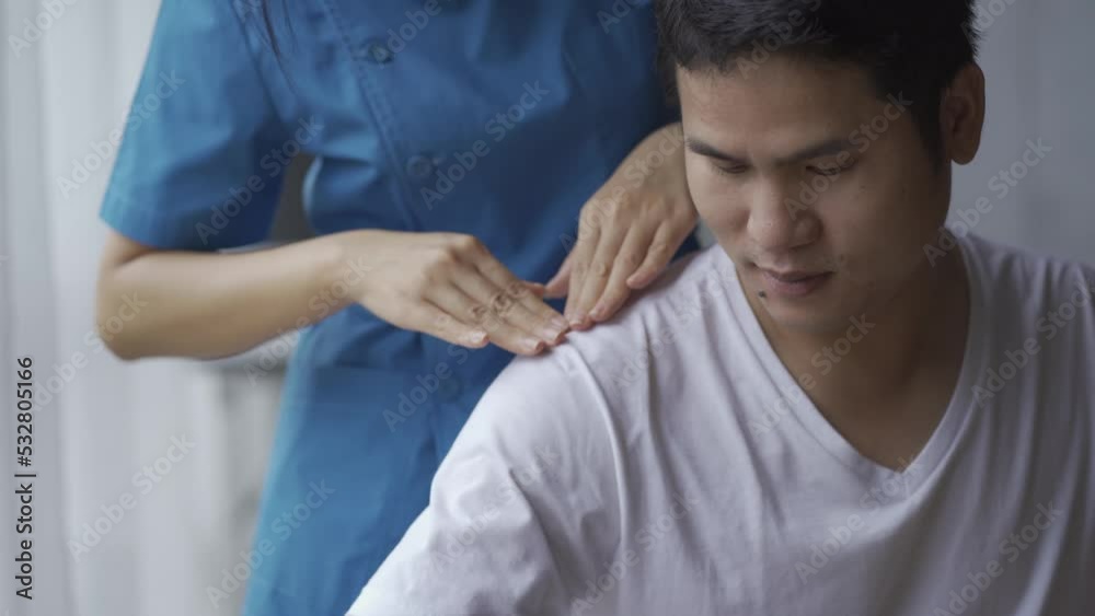 Asian male physiotherapy with muscle pain in arms and shoulders Asian male physiotherapy with muscle pain in arms and shoulders