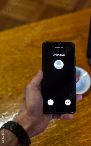 Wallpaper Mural Phone call from unknown number. Scam, fraud or phishing with smartphone concept. Prank caller, scammer or stranger. Man answering to incoming call. Hoax person with fake identity. Torontodigital.ca