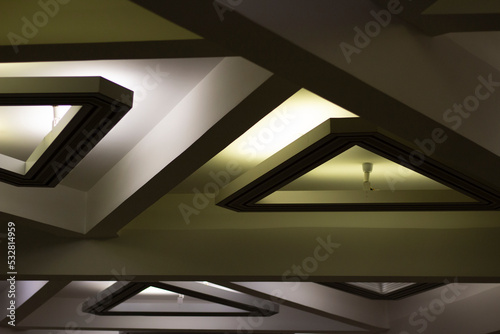 Interior light. Lamp is triangular.