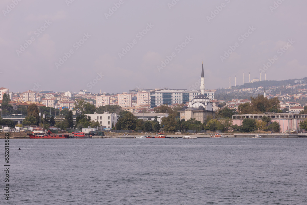 silhouette Istanbul city buildings from water Bosphorus or Golden Horn, public places.