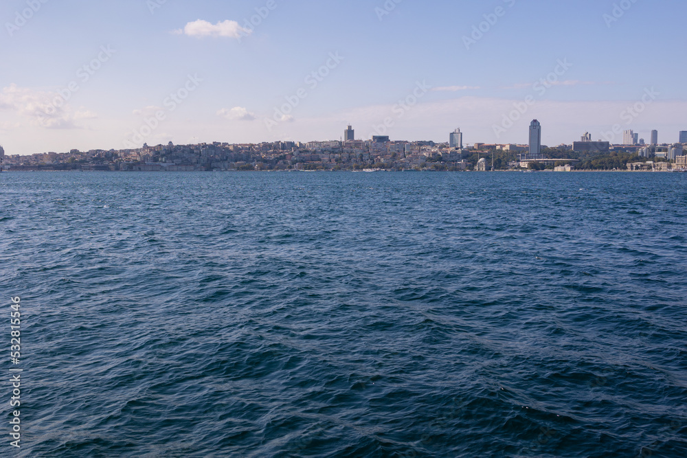 silhouette Istanbul city buildings from water Bosphorus or Golden Horn, public places.