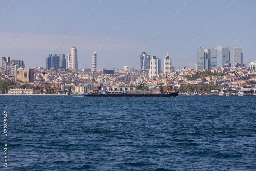 silhouette Istanbul city buildings from water Bosphorus or Golden Horn, public places.