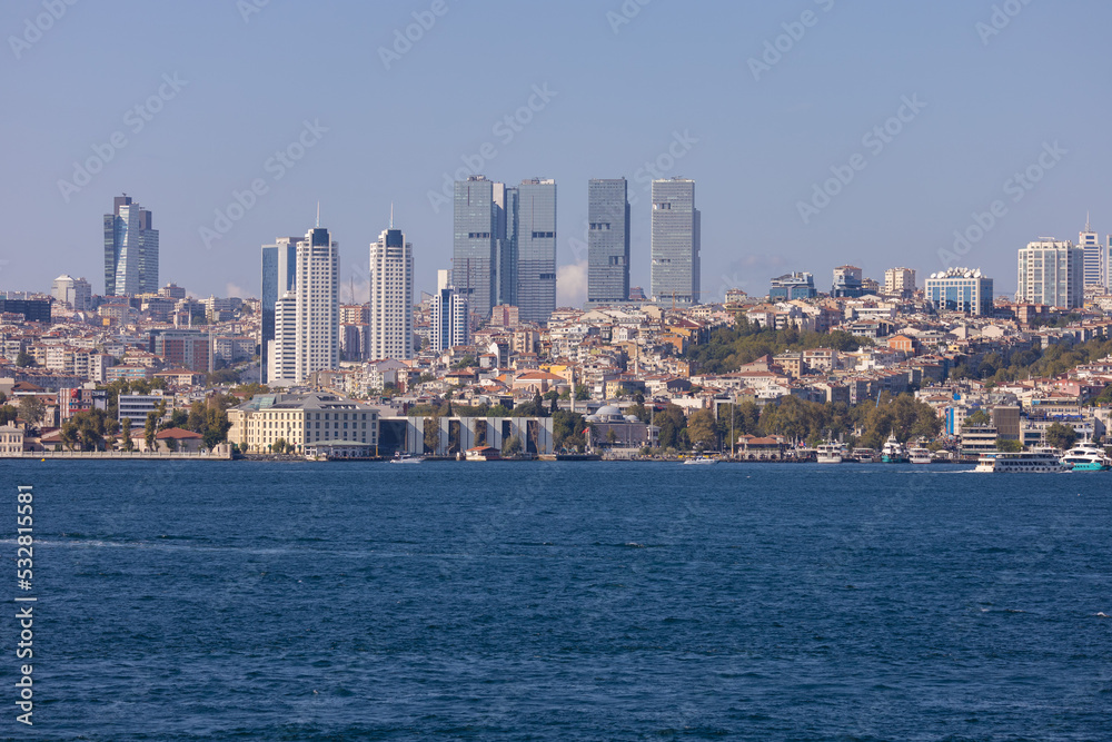 Fototapeta premium silhouette Istanbul city buildings from water Bosphorus or Golden Horn, public places.