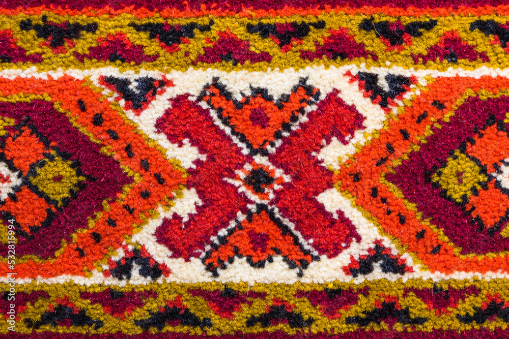 Part of old vintage carpet texture with abstract ornament
