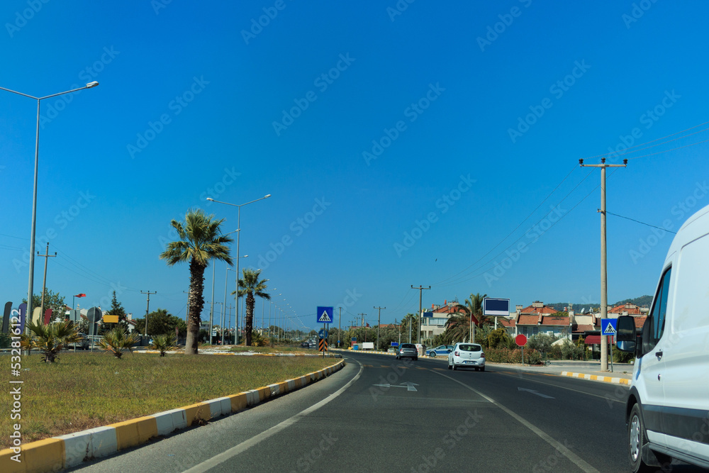 Highway wide road, transport and blue sky with clouds on a summer day