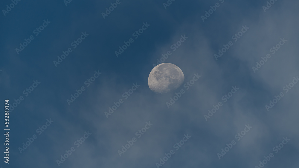 Moon and clouds in the early morning light Moon and clouds in the early morning light