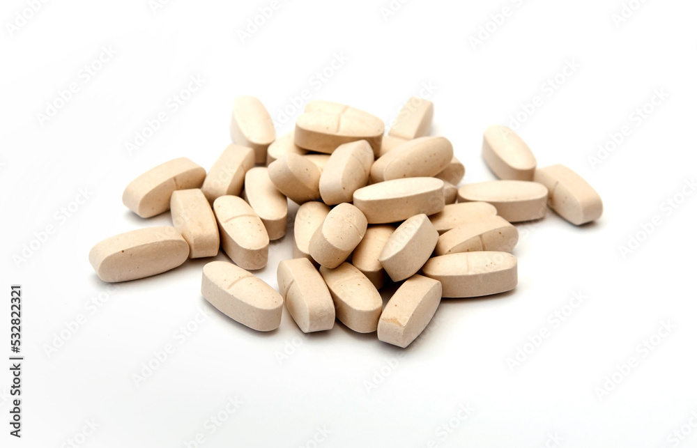 Pills on a white background. Medicines, medical capsules, dietary supplements, vitamins. Medicines close-up. Pills on a white background. Medicines, medical capsules, dietary supplements, vitamins. Medicines close-up.