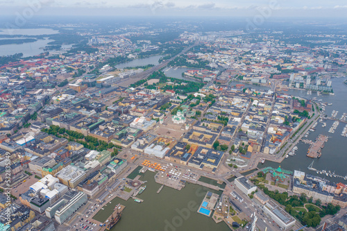 Helsinki Downtown Cityscape, Finland. Cathedral Square, Market Square, Sky Wheel, Port, Harbor in Background. Drone Point of View