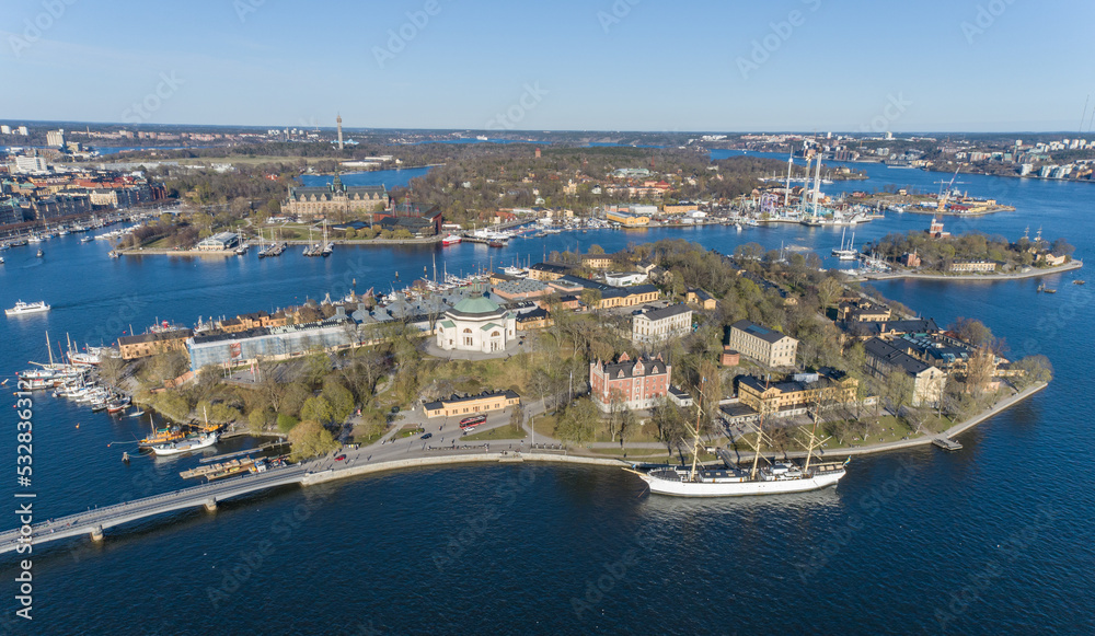 Stockholm island and Af Chapman and Admiralty House. Full-rigged Steel Ship Moored on the Western Shore of the Islet Skeppsholmen in Central Stockholm, Sweden, Now Serving as a Youth Hostel