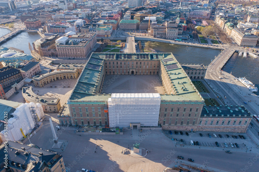 Fototapeta premium Stockholm Old Town and Royal Palace in Background. It is located in Gamla Stan Island in Stockholm, Sweden. Drone Point of View