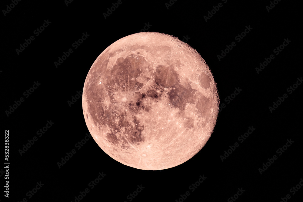 Naklejka premium Big red super moon (blood moon) as seen from Normandy, France, in July 2022