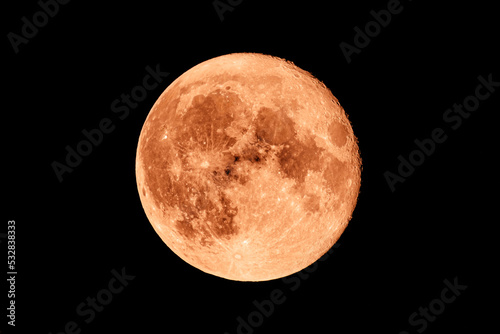 Big red super moon (blood moon) as seen from Normandy, France, in July 2022