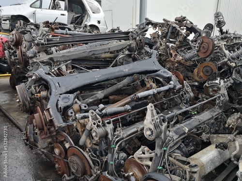 The scrap yard engine and cars parts.  © Maristos