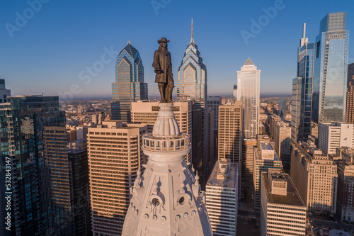 Statue of William Penn. William Penn is a bronze statue by Alexander Milne Calder of William Penn. It is located atop the Philadelphia City Hall, Pennsylvania. photo