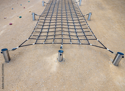 Climbing net wall in outdoor kids playground gym