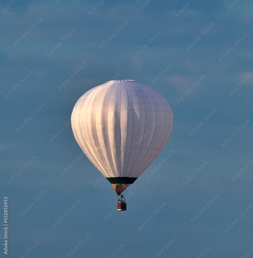 Fototapeta premium White balloon in the sky. A wonderful natural landscape.