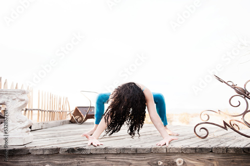 Fototapeta Beautiful Hispanic Yoga Woman.