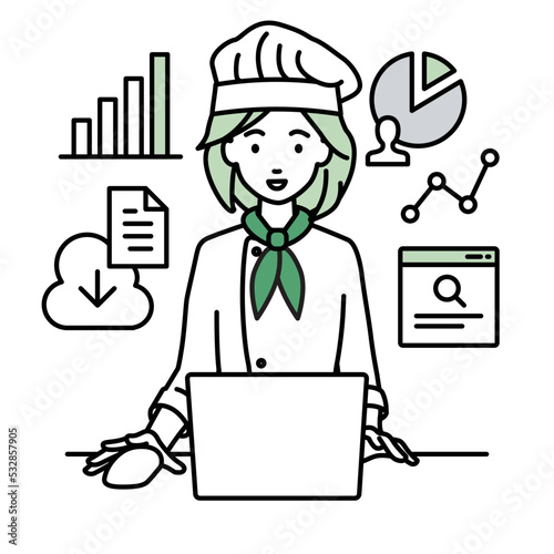 デスクでPCを前にリサーチ・データ分析・レポート作成をしている調理師の女性