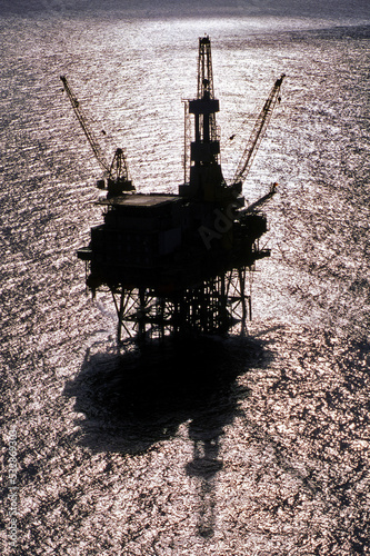  SILHOUETTE of an offshore supply platform on Bass Strait in Victoria Australia.