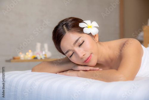 Asian woman sleep and relax in Thai spa shop