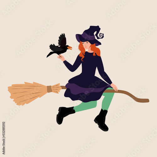 Young woman in witch Halloween costume on broom