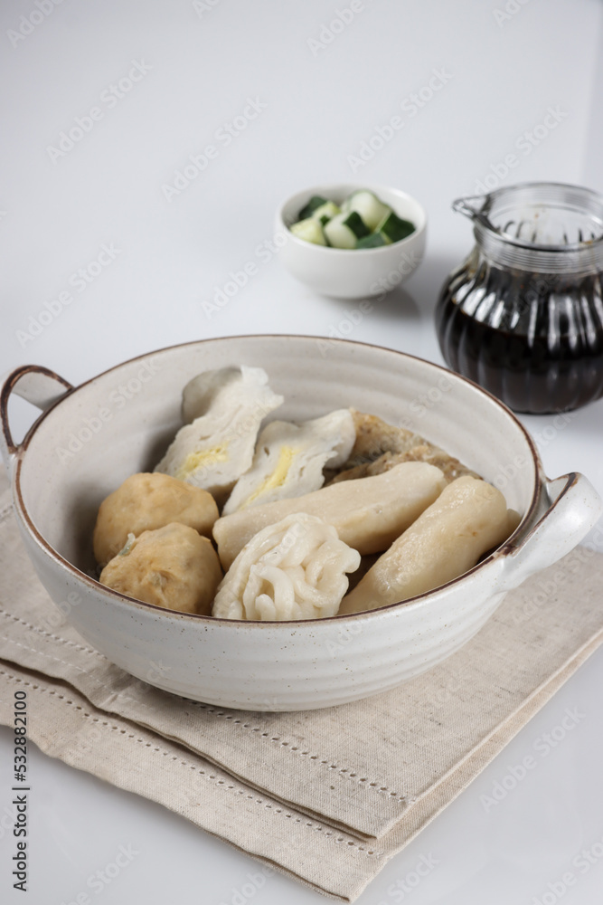 Pempek Palembang Rebus is steamed fish cake served with cuko. Pempek Palembang Rebus is steamed fish cake served with cuko.