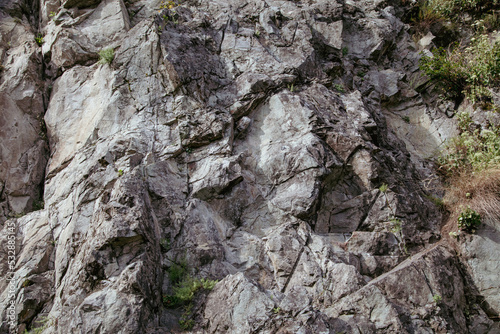 Stone rocks on the mountain as background.