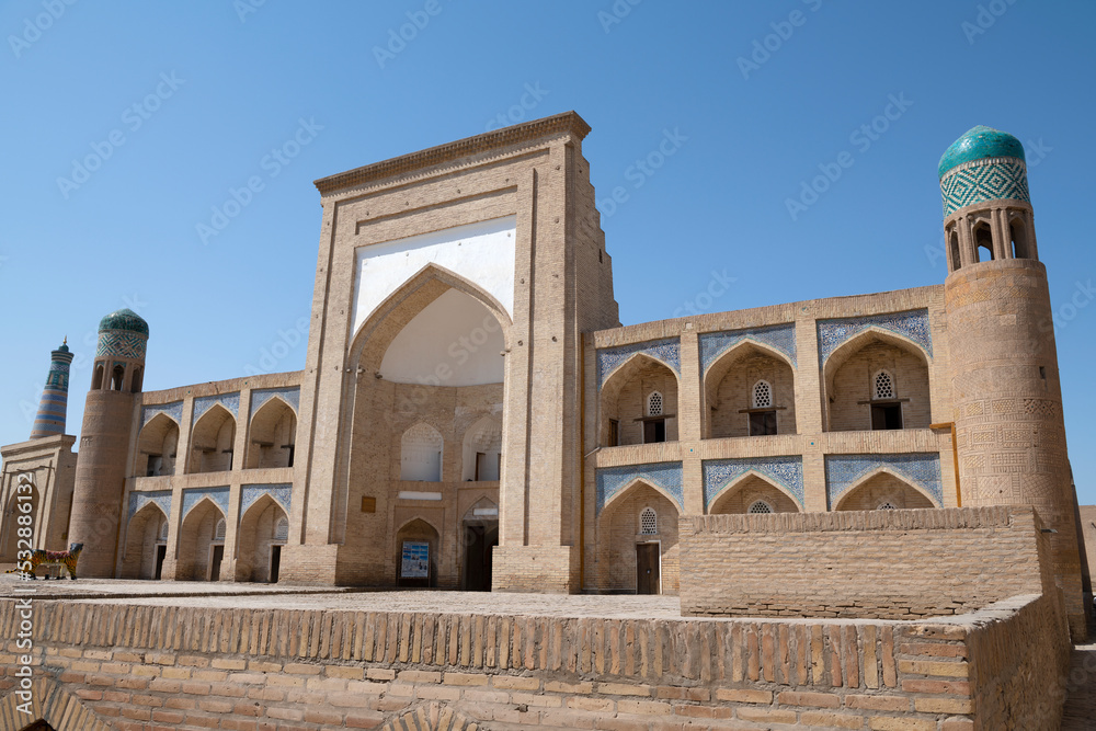 Old  Kutlug-Murad-Inaka madrasah on a sunny day. Khiva, Uzbekistan
