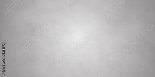 Monochrome texture painted on canvas. Artistic cotton grunge Gray background with white light effect
