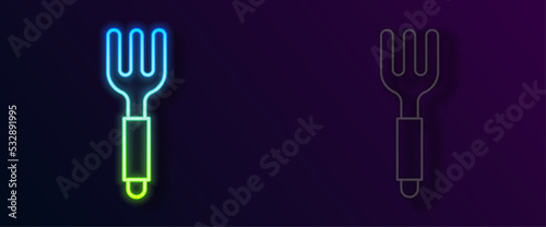 Glowing neon line Fork icon isolated on black background. Cutlery symbol. Vector